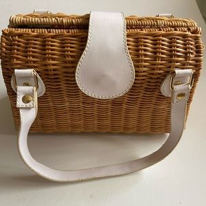 Amanda Smith wicker handbag with white leather detailing.